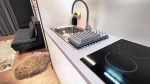 Кухня или мини-кухня в Feel Good Vibes - Apt Suite Athens
 +17 фотографий