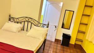 Postel nebo postele na pokoji v ubytování Muffys Guest House