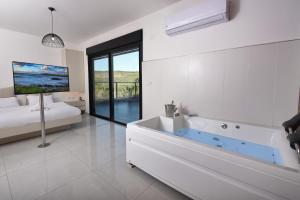 Fotografie z fotogalerie ubytování קולינה וארדה v destinaci ‘Amqa