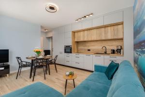 Kuchyňa alebo kuchynka v ubytovaní Green Square Apartments Świnoujście by Noclegi Renters