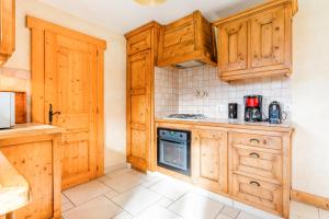 Una cocina o zona de cocina en Gîte des Cascades