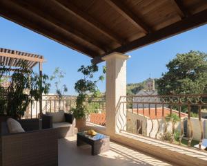 A balcony or terrace at Nicole Villa, an Enchanted Gem, By ThinkVilla