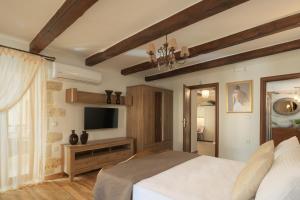 A television and/or entertainment centre at Nicole Villa, an Enchanted Gem, By ThinkVilla