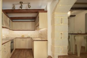 A kitchen or kitchenette at Nicole Villa, an Enchanted Gem, By ThinkVilla
