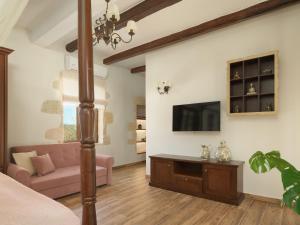 A television and/or entertainment centre at Nicole Villa, an Enchanted Gem, By ThinkVilla