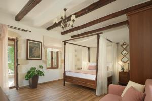 A bed or beds in a room at Nicole Villa, an Enchanted Gem, By ThinkVilla