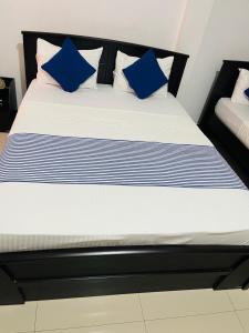 Ama Residence客房内的一张或多张床位