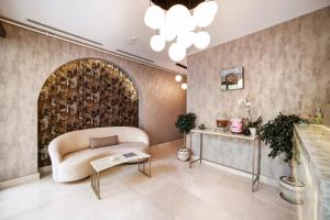 A seating area at The Pearl Suites