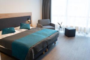 Postel nebo postele na pokoji v ubytování Hotel Am Park