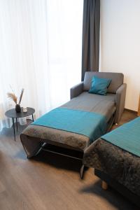 Postel nebo postele na pokoji v ubytování Hotel Am Park