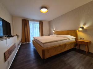 Postel nebo postele na pokoji v ubytování Apartmán U Labe