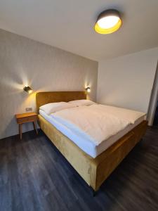 Postel nebo postele na pokoji v ubytování Apartmán U Labe