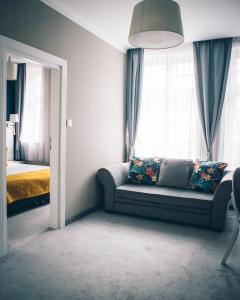 Łóżko lub łóżka w pokoju w obiekcie Hotel Villa Art Novis City Center