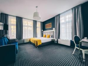 Łóżko lub łóżka w pokoju w obiekcie Hotel Villa Art Novis City Center