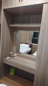 Giường trong phòng chung tại Ming Camphor Homestay