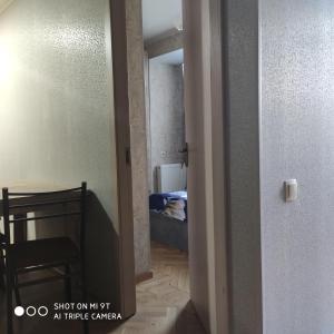 Ένα ή περισσότερα κρεβάτια σε δωμάτιο στο per day +1 φωτογραφίες