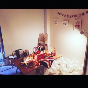 a living room with a table with presents on it at Solitary House in Seoul