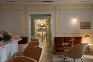 Posezení v ubytování Leopolis Hotel