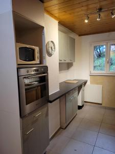 Kuchyň nebo kuchyňský kout v ubytování Chalet Amanda