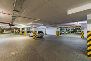 Posilňovňa alebo fitness centrum v ubytovaní Wilczak Apartment with FREE GARAGE Poznań by Noclegi Renters
