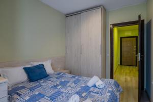 Postel nebo postele na pokoji v ubytování Intelligent Elephant Home - 1BDR Apartment by Flat Mаnager