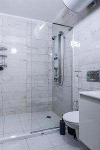 Koupelna v ubytování Intelligent Elephant Home - 1BDR Apartment by Flat Mаnager