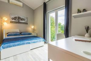 Posteľ alebo postele v izbe v ubytovaní Modern and Elegant Apartment in a Quiet Part of Pula