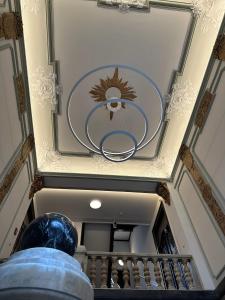 a view from the top of a staircase with a ceiling at Hotel Seifert Berlin am Kurfürstendamm in Berlin