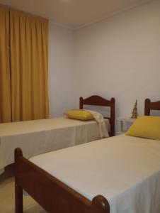 En eller flere senge i et værelse på Casa D a 2 - Jacuzzi - Parrilla - Centro de Federación