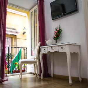 Televízia a/alebo spoločenská miestnosť v ubytovaní Un Patio en Santa Cruz