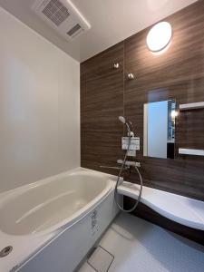 Koupelna v ubytování Furano Yukisachi House + 30 fotografií