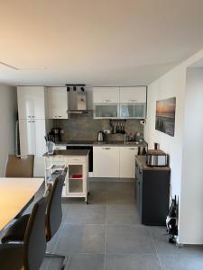 Kuchyň nebo kuchyňský kout v ubytování Apartment MM22