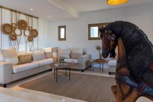 Posezení v ubytování Amalgam Homes Paros