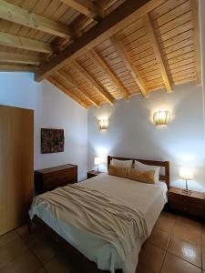 Postel nebo postele na pokoji v ubytování Montes da Salvada
