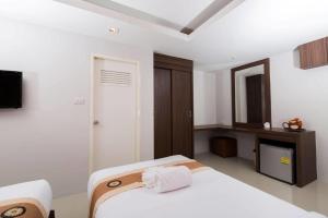 Postel nebo postele na pokoji v ubytování Royal Asia Hotel Pratunam