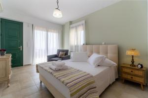 Posteľ alebo postele v izbe v ubytovaní Sapphire Blue Villa