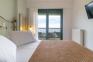 Posteľ alebo postele v izbe v ubytovaní Sapphire Blue Villa
