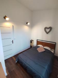 Postel nebo postele na pokoji v ubytování Appartement Saint Palais sur Mer à 100 mètres de la plage