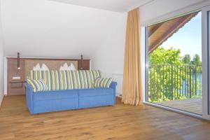 Hotel Stadler am Attersee的阳台或露台