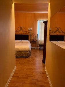 Voodi või voodid majutusasutuse Gîte Le Roupillon en Beauce toas