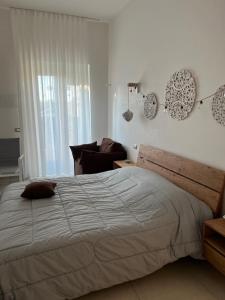 Postel nebo postele na pokoji v ubytování B&B Al tramonto Otranto