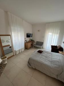 Postel nebo postele na pokoji v ubytování B&B Al tramonto Otranto