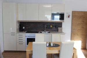 Kuchyň nebo kuchyňský kout v ubytování Home W4 - Apartment Engel