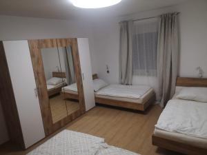 Postel nebo postele na pokoji v ubytování Home W4 - Apartment Engel