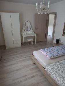 Postel nebo postele na pokoji v ubytování Ferienwohnung Valentina