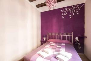 מיטה או מיטות בחדר ב-Consell Cent apartment I 3 dormitorios Eixample