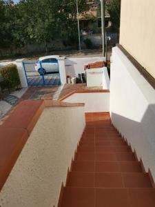 a stairway leading up to the side of a building at Casa Pipere in Santa Lucia