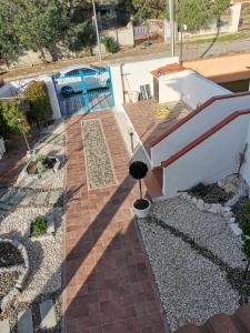 a view of a patio with a staircase and a building at Casa Pipere in Santa Lucia