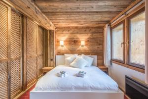 Posteľ alebo postele v izbe v ubytovaní Chalet du Jaillet - Welkeys