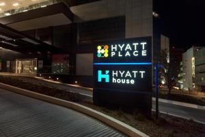 a hyatt place sign in front of a building at Hyatt House Monterrey Valle San Pedro in Monterrey